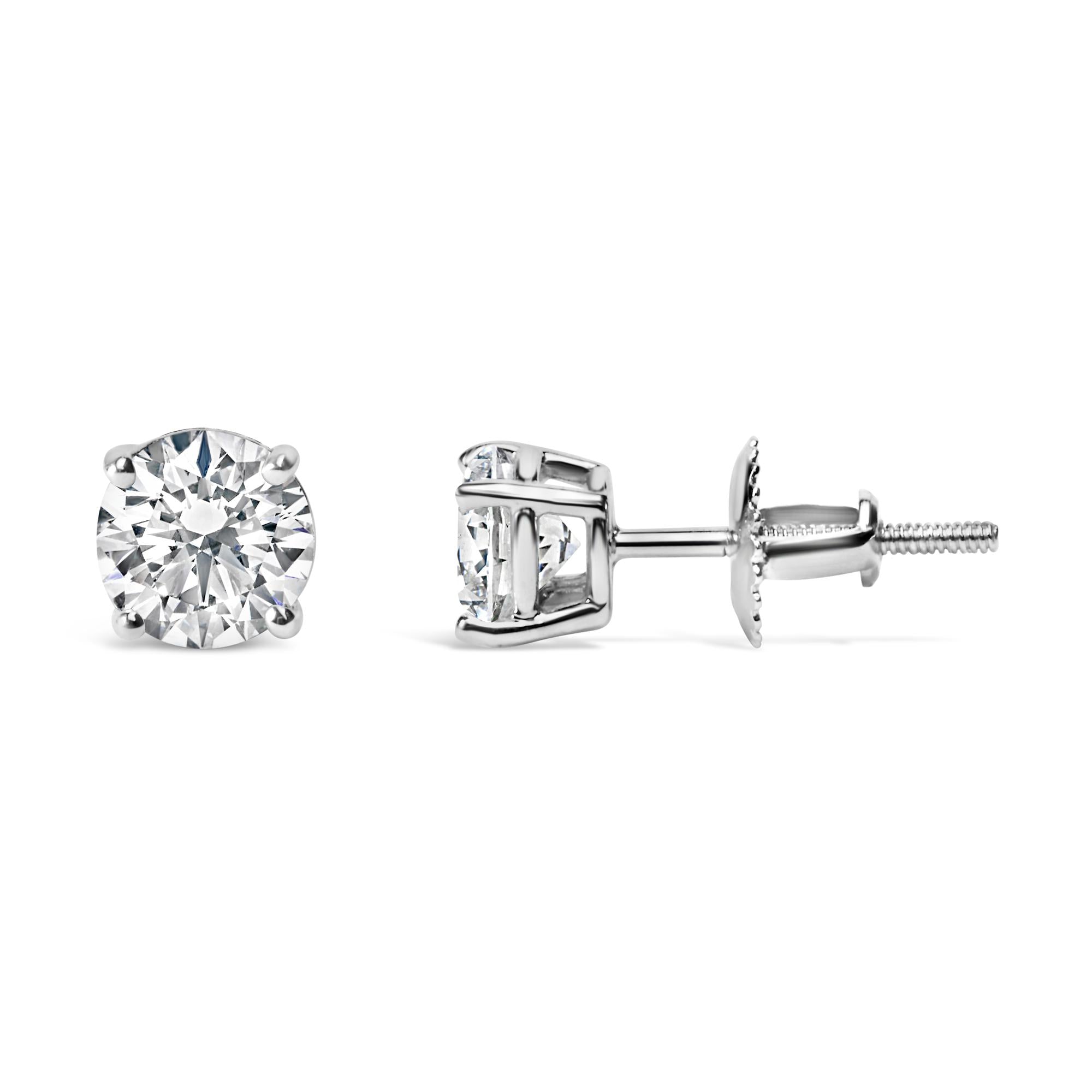 Pair of IGI certified diamond stud earrings on a white background