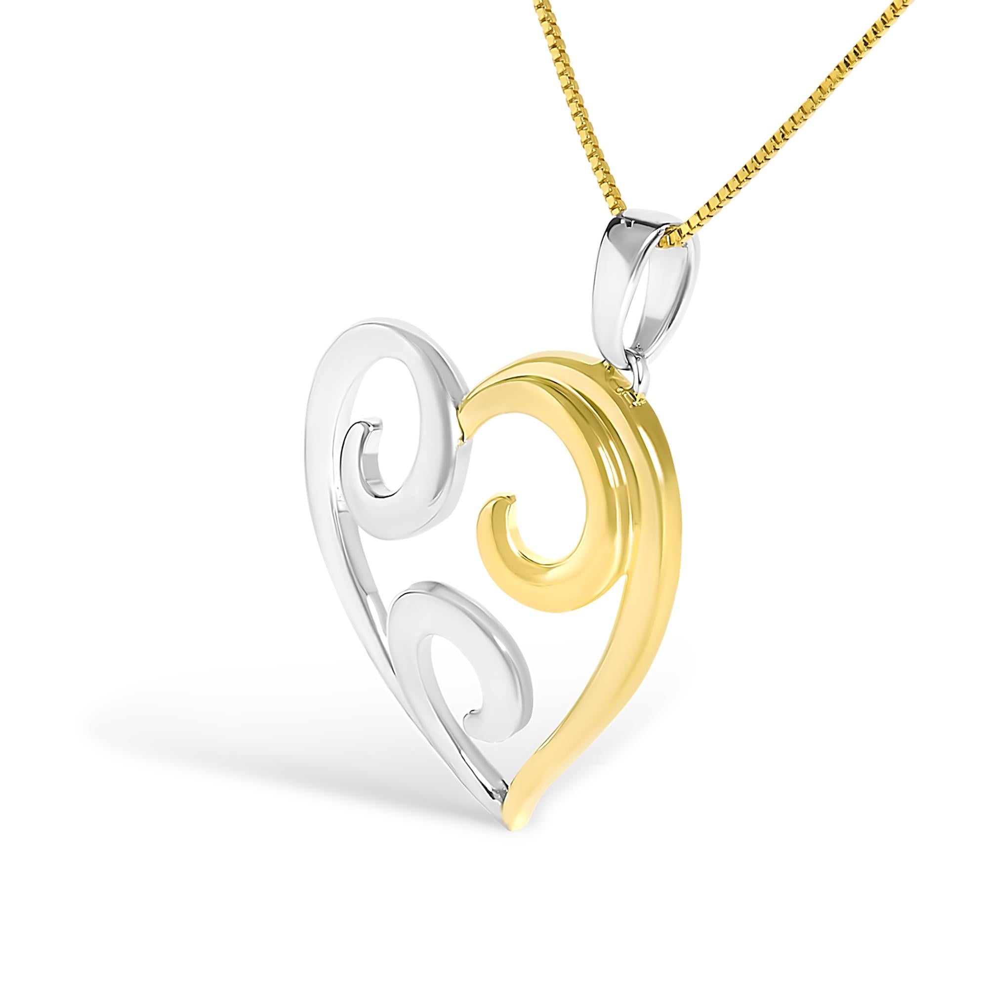 Two-tone heart-shaped pendant on a gold chain against a white background