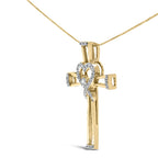 Gold cross pendant with heart design on a white background