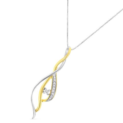 Two-tone silver and gold pendant with diamonds on a white background