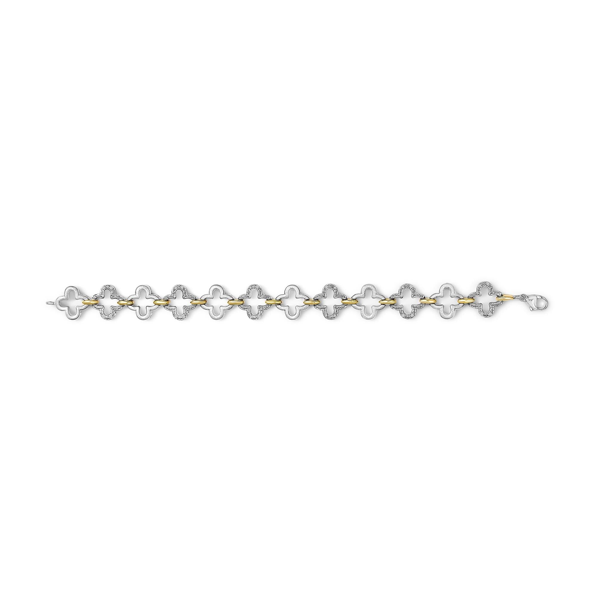 Bracelet with alternating gold and silver links on a white background