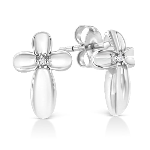 Silver flower-shaped earrings on a white background