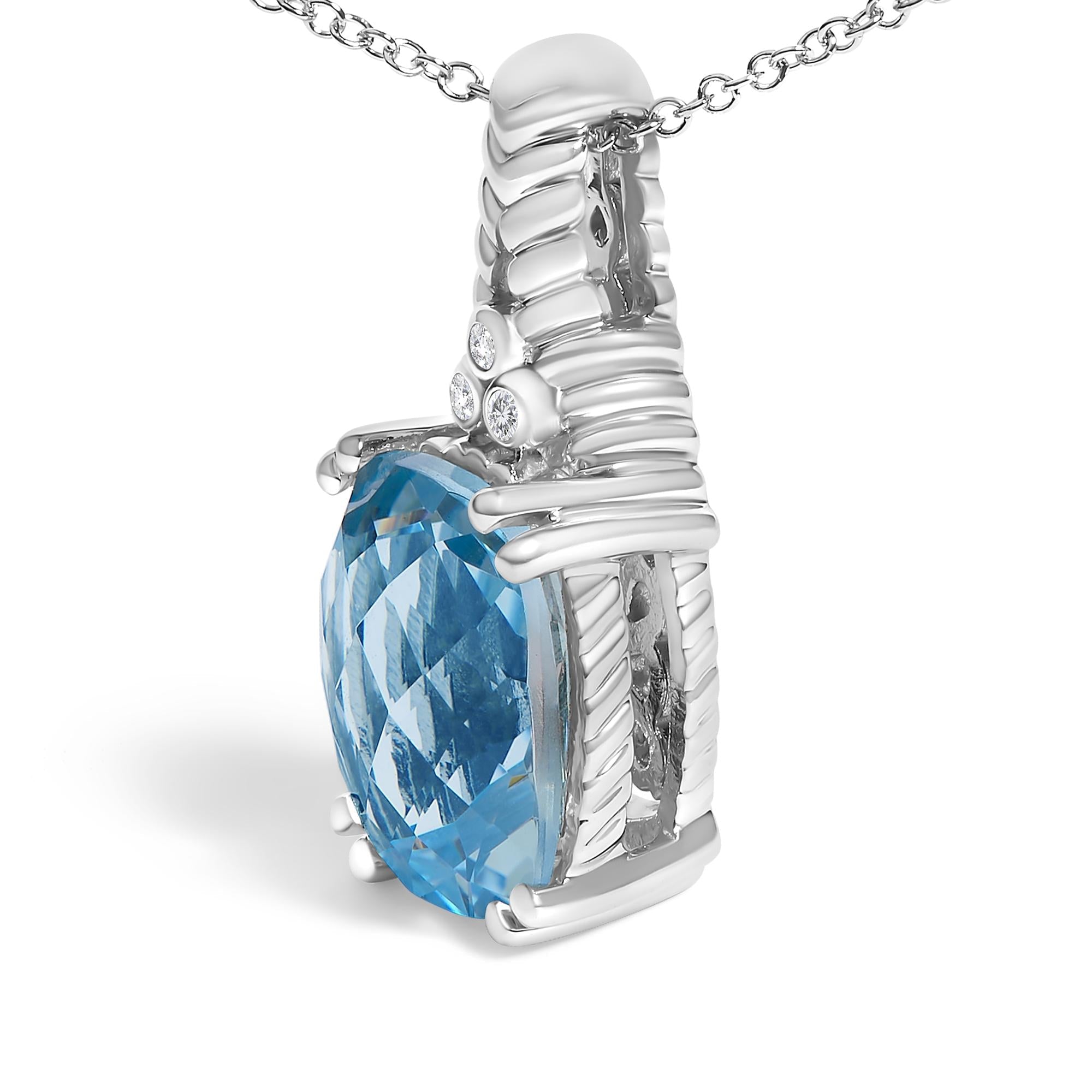 Silver pendant with a blue gemstone on a white background