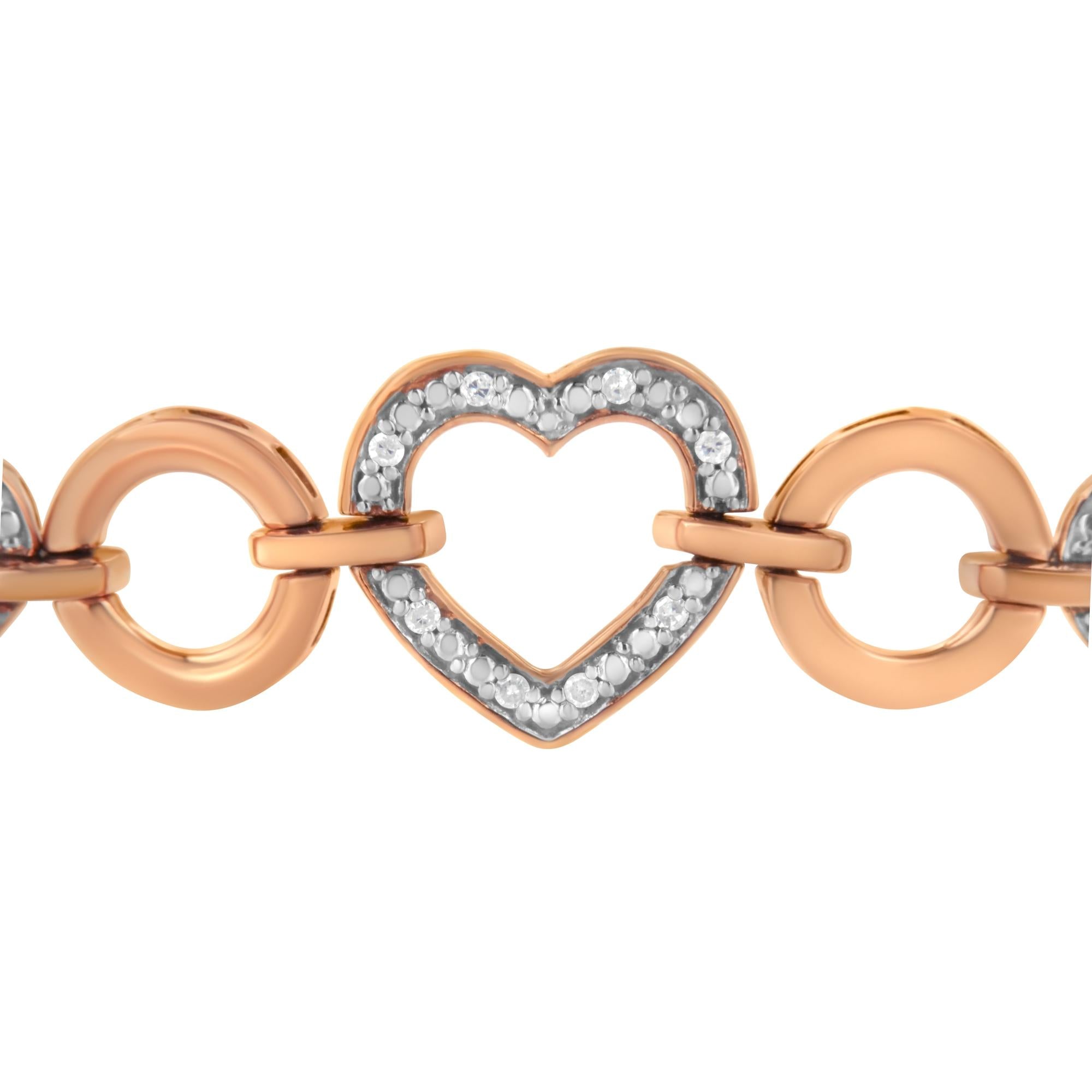 Rose gold bracelet with heart-shaped link and diamonds on a white background