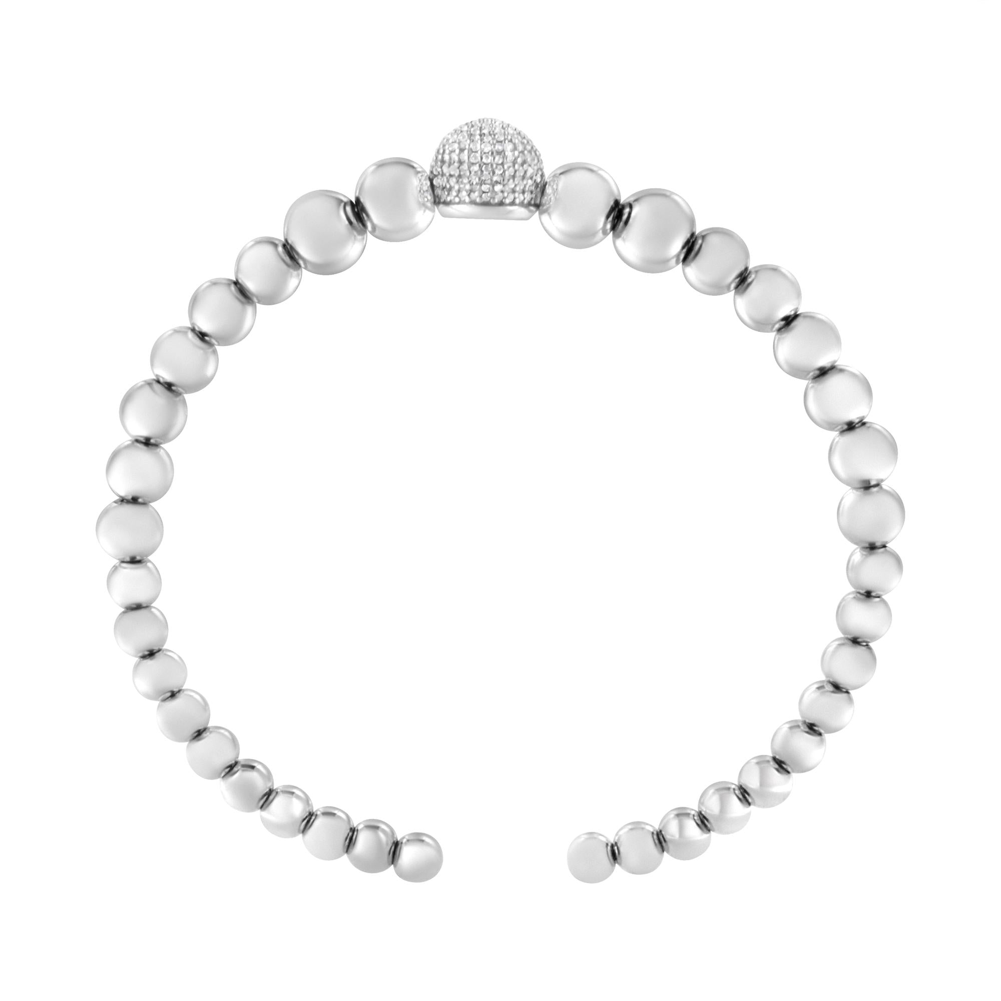 Silver beaded bracelet with a silver clasp on a white background