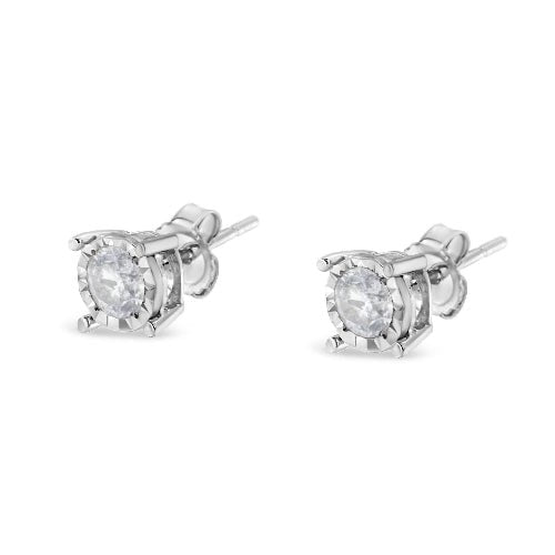 Pair of silver stud earrings with clear gemstones on a white background