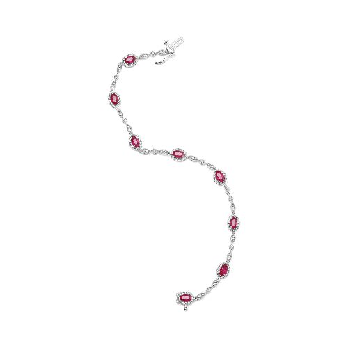 Silver bracelet with red gemstones on a white background