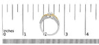 Gold and silver ring with measurement scale on a white background