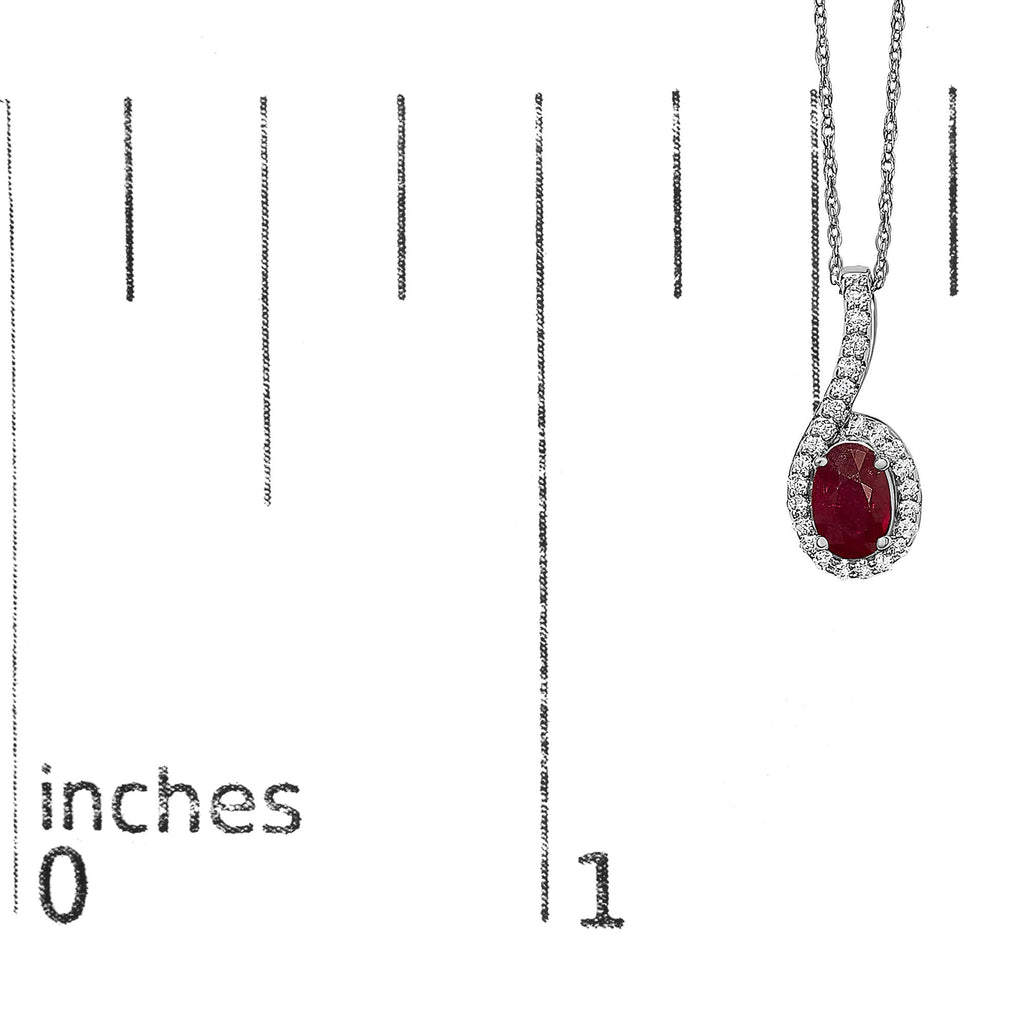 Ruby pendant necklace with chain on a white background with measurement scale