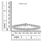 Silver bracelet with measurement scale in millimeters and inches