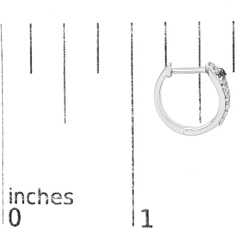 Silver hoop earring with clear gemstones on a white background with measurement scale.