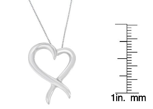 Silver heart-shaped pendant with a measurement scale on a white background