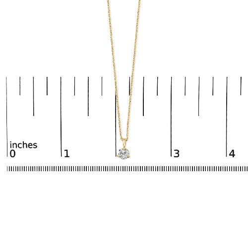 Gold necklace with a diamond pendant on a white background with measurement scale.
