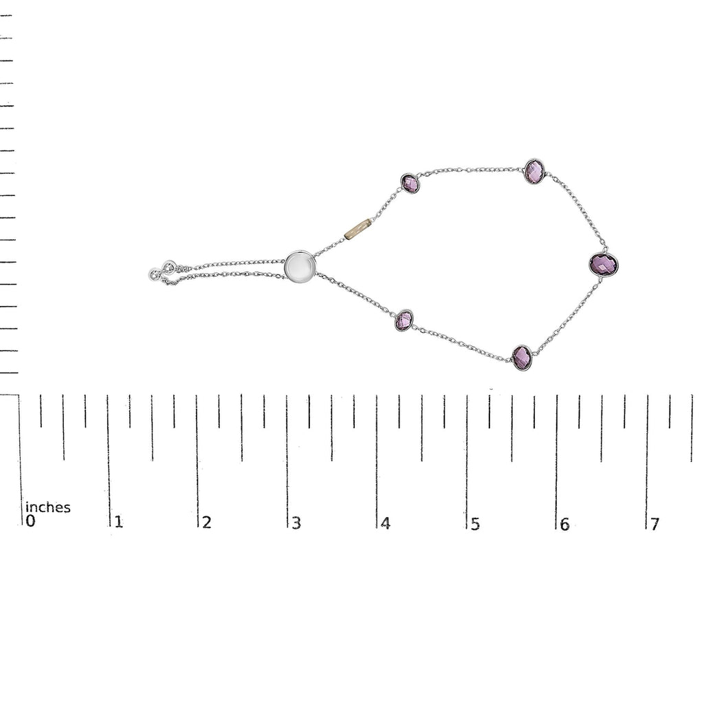 Necklace with pink beads and a white pearl on a white background with a measurement scale.