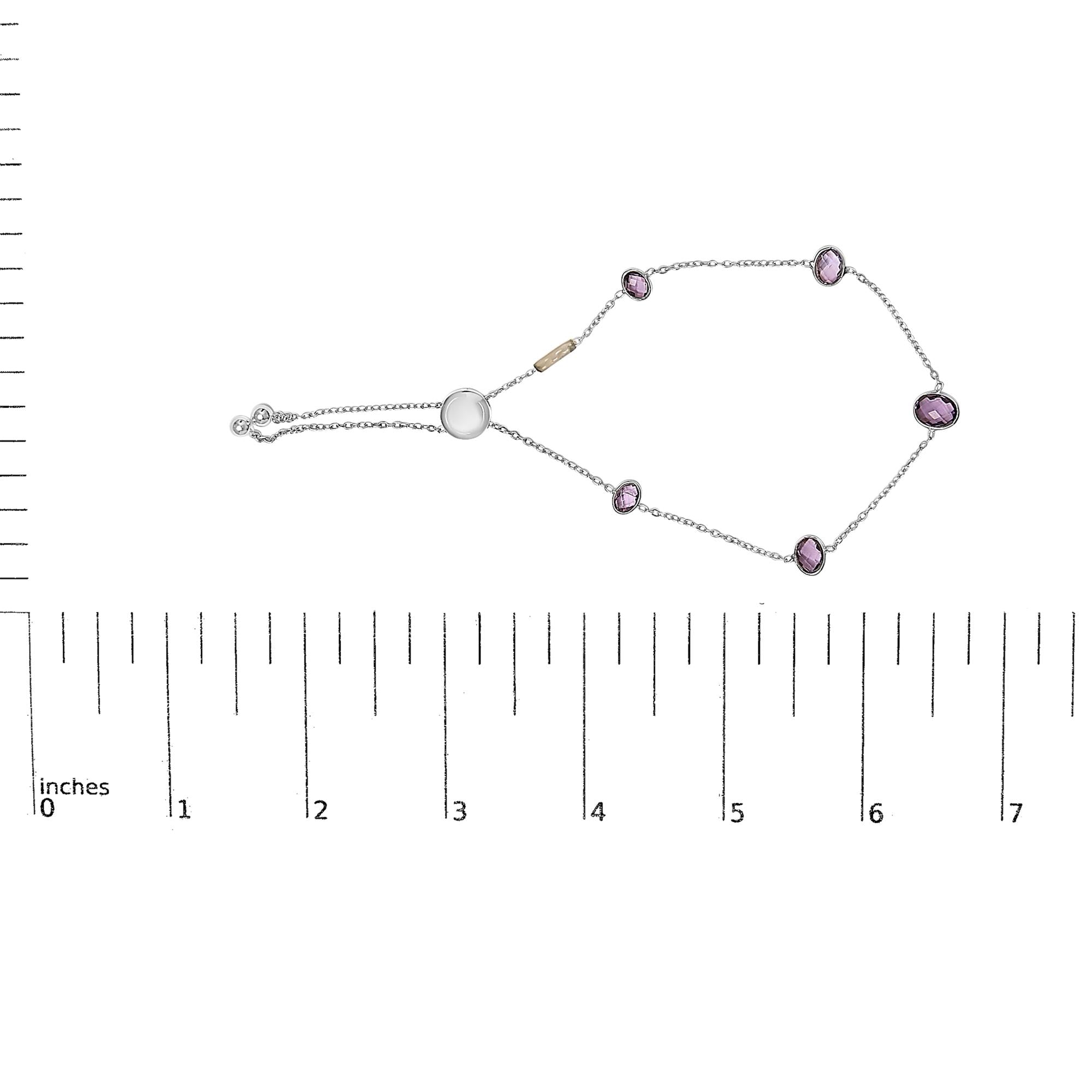 Necklace with pink beads and a white pearl on a white background with a measurement scale.