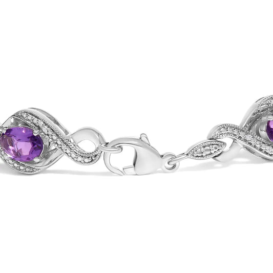 .925 sterling silver 1/10 cttw natural round diamond and 7x5mm oval amethyst cross tennis bracelet (i j color i1 i2 clarity) 7’’