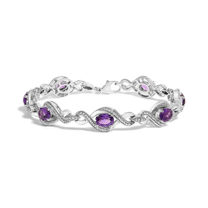 .925 sterling silver 1/10 cttw natural round diamond and 7x5mm oval amethyst cross tennis bracelet (i j color i1 i2 clarity) 7’’