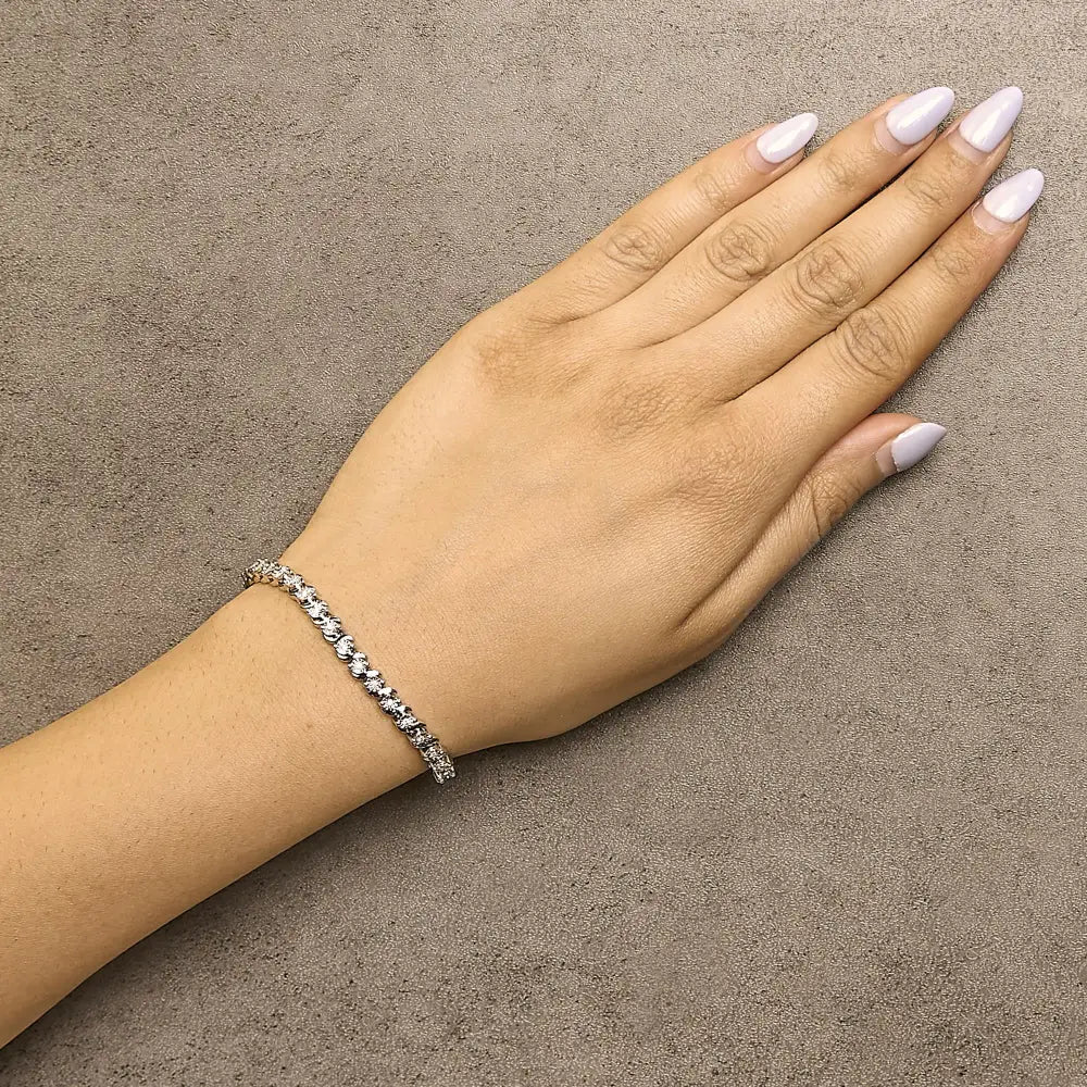 1/4 cttw diamond s link bracelet in rhodium plated.925 sterling silver bijoux-nyc direct