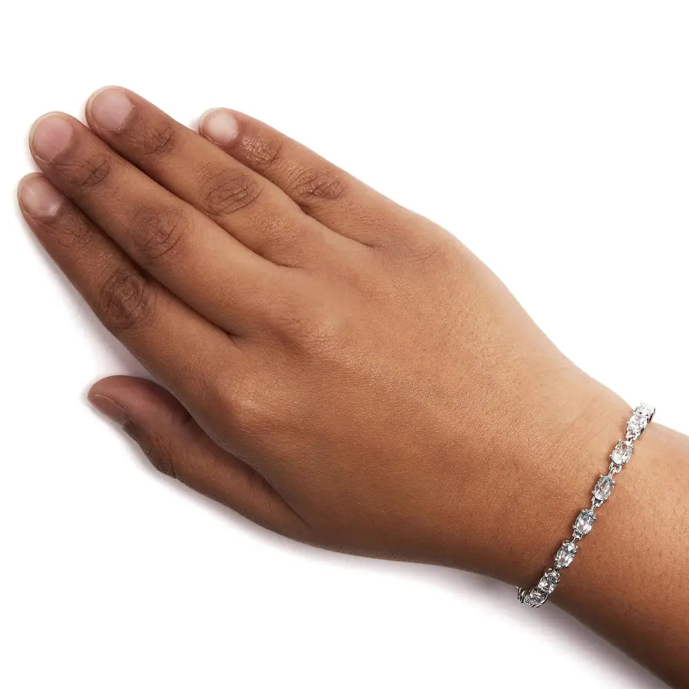 Sterling silver 11.0 cttw oval created blue topaz link bracelet 7 inch bijoux-nyc direct
