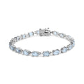Sterling silver 11.0 cttw oval created blue topaz link bracelet 7 inch bijoux-nyc direct