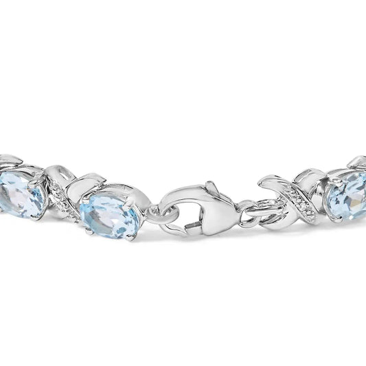 .925 sterling silver 16.0 cttw oval blue topaz and diamond accent tennis x link bracelet (i j color i1 i2 clarity) size 7’’ inch