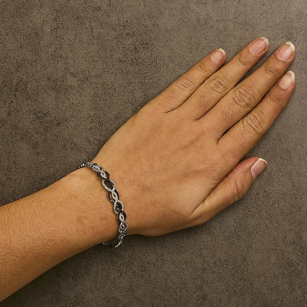 .925 sterling silver 3/8 cttw white and black diamond swirl bangle bracelet (black color i3 clarity) 7.75’’ inches