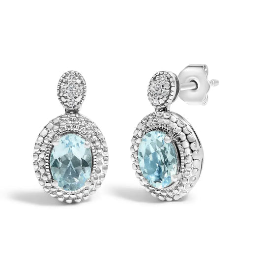 .925 Sterling Silver Diamond Accent and Oval Blue Topaz with Beaded Halo Drop Stud Earrings (I-J color, I1-I2 Clarity) - Bijoux-NYC Direct