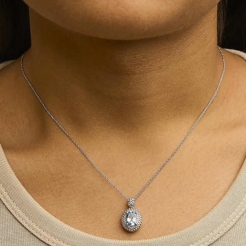 Blue topaz & diamond beaded halo pendant necklace in sterling silver
