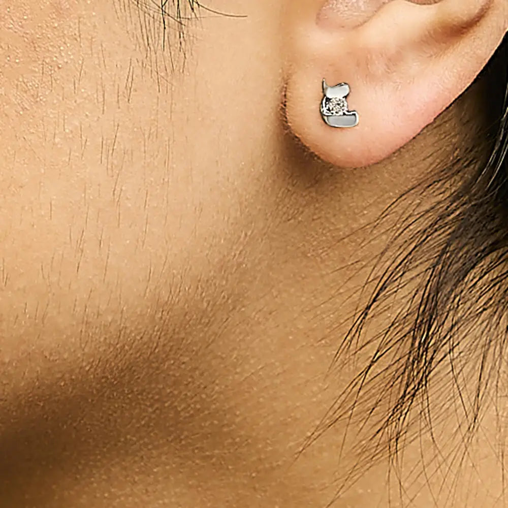 Round cut diamond stud earrings in.925 sterling silver 0.10 cttw bijoux-nyc direct