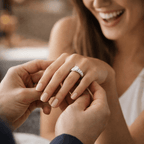 Women wearing a diamond engagement ring on a blurred background