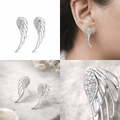 Silver leaf-shaped earrings with clear stones, shown from multiple angles including close-up of an ear.