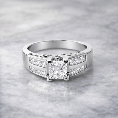 White gold ring with a large diamond and smaller diamonds on a gray background