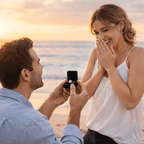 Man proposing to a woman on a beach at sunset