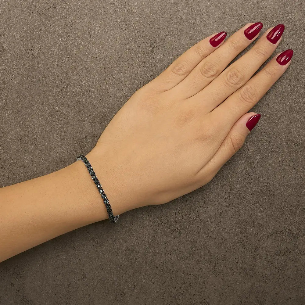 Blue diamond miracle tennis bracelet in black rhodium sterling silver