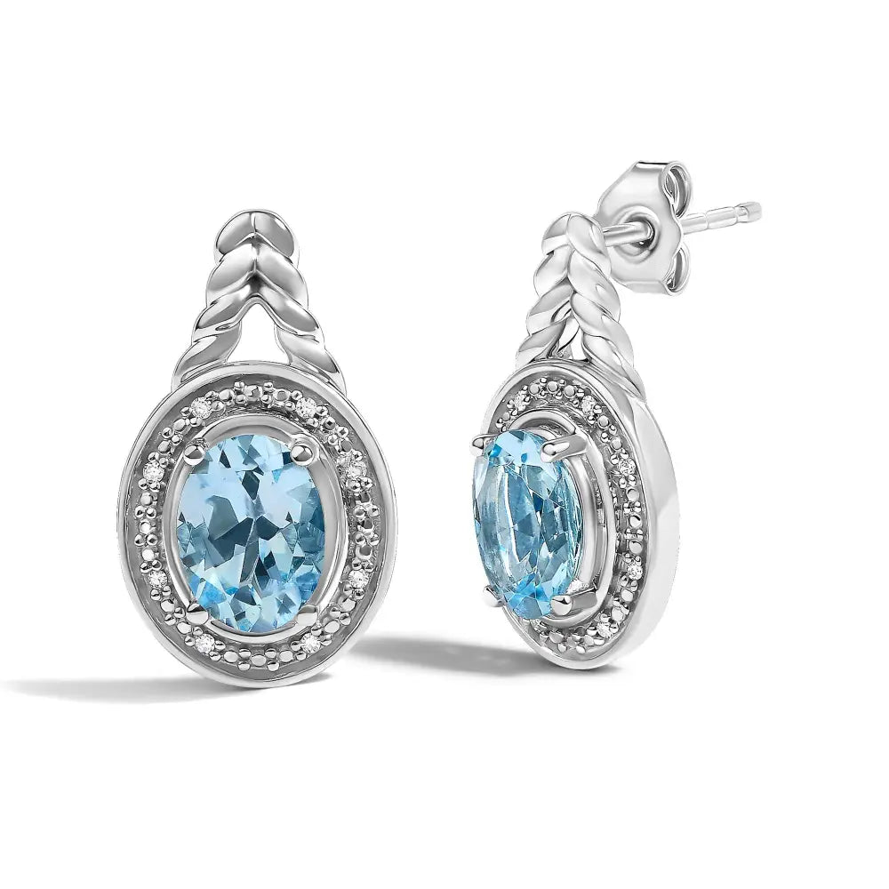 Oval blue topaz and diamond halo twist drop earrings in sterling silver bijoux-nyc direct