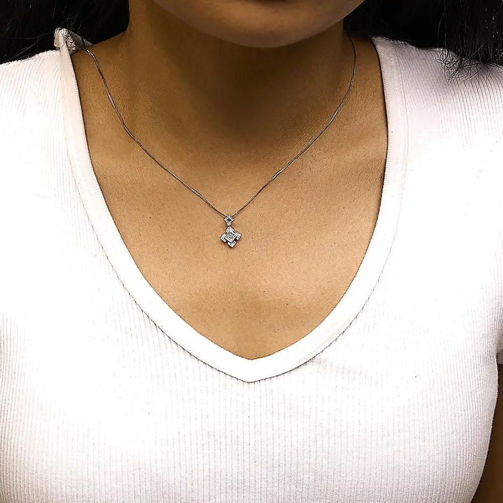 1/5 cttw diamond geometric halo pendant in 10k white gold bijoux-nyc direct