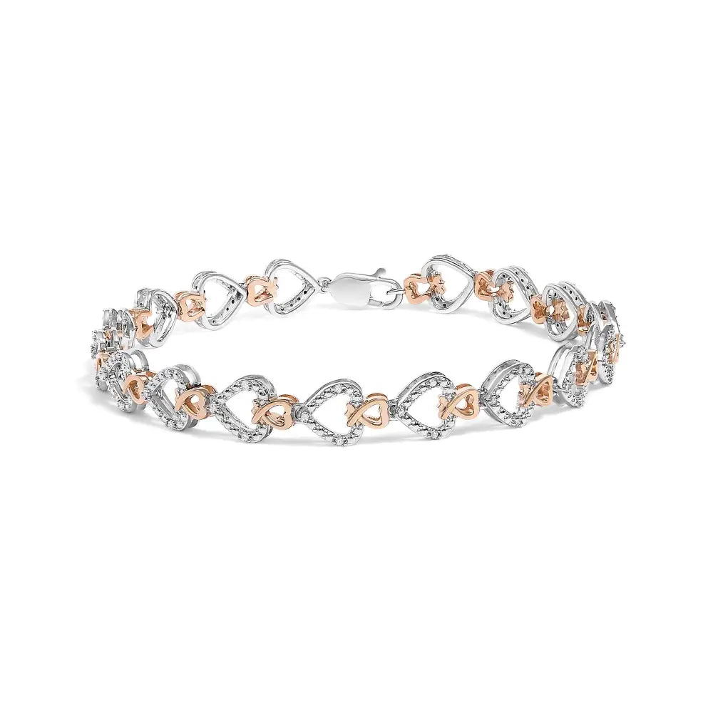 Diamond infinity and swirl link bracelet in 10k two tone gold 1/4 cttw bijoux-nyc direct