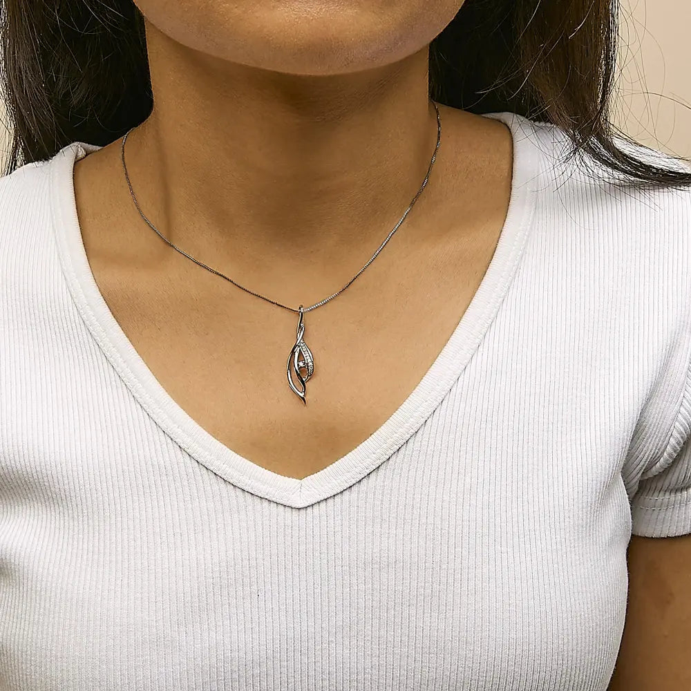 Espira 10k white gold round diamond accented open cascade twist 18’’ pendant necklace (1/10 cttw j k color i1 i2 clarity)