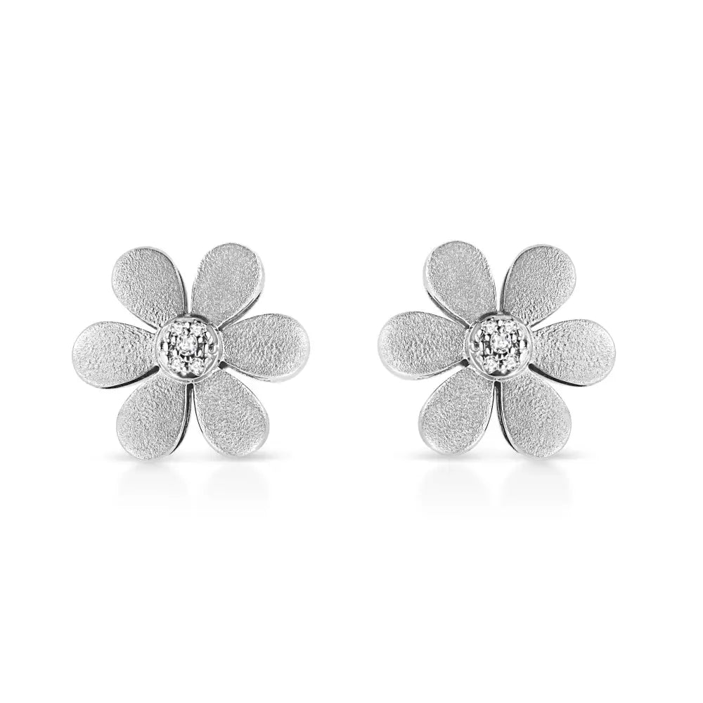 Diamond accent flower stud earrings in matte sterling silver – 1/20 cttw bijoux-nyc direct
