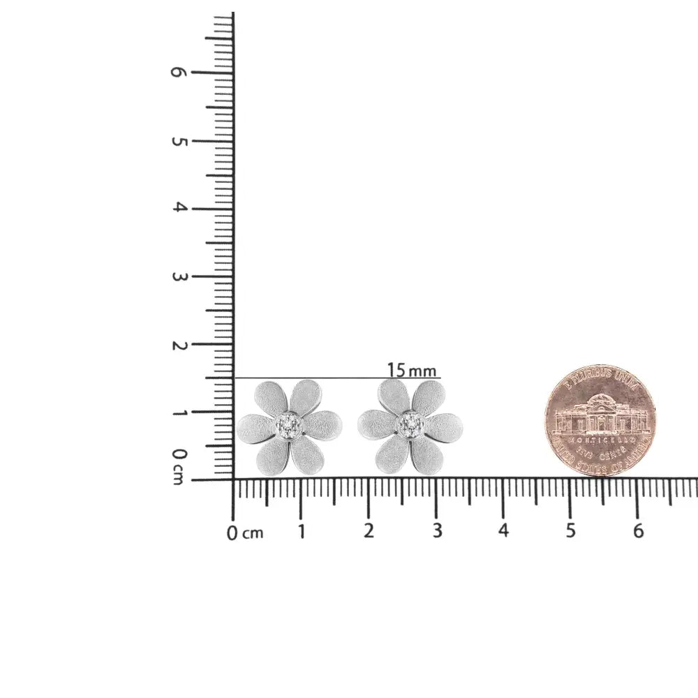 Diamond accent flower stud earrings in matte sterling silver – 1/20 cttw bijoux-nyc direct