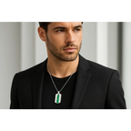 man wearing Men’s .925 Silver Green Emerald Dog Tag Pendant Necklace – 22" | Bijoux-NYC Direct

Meta Tag Description:
Discover modern style with this sterling silver men’s dog tag pendant featuring lab-created emeralds. Limited edition at Bijoux-NYC Direct.

URL Slug:
mens-sterling-silver-green-emerald-dog-tag-necklace