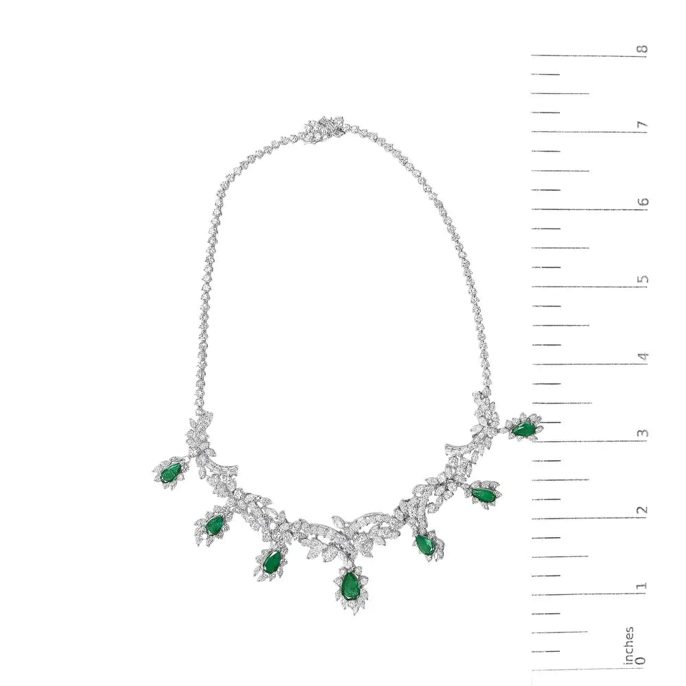 Platinum brazilian emerald and diamond jewelry set 38.30ct 19.76ct bijoux-nyc direct