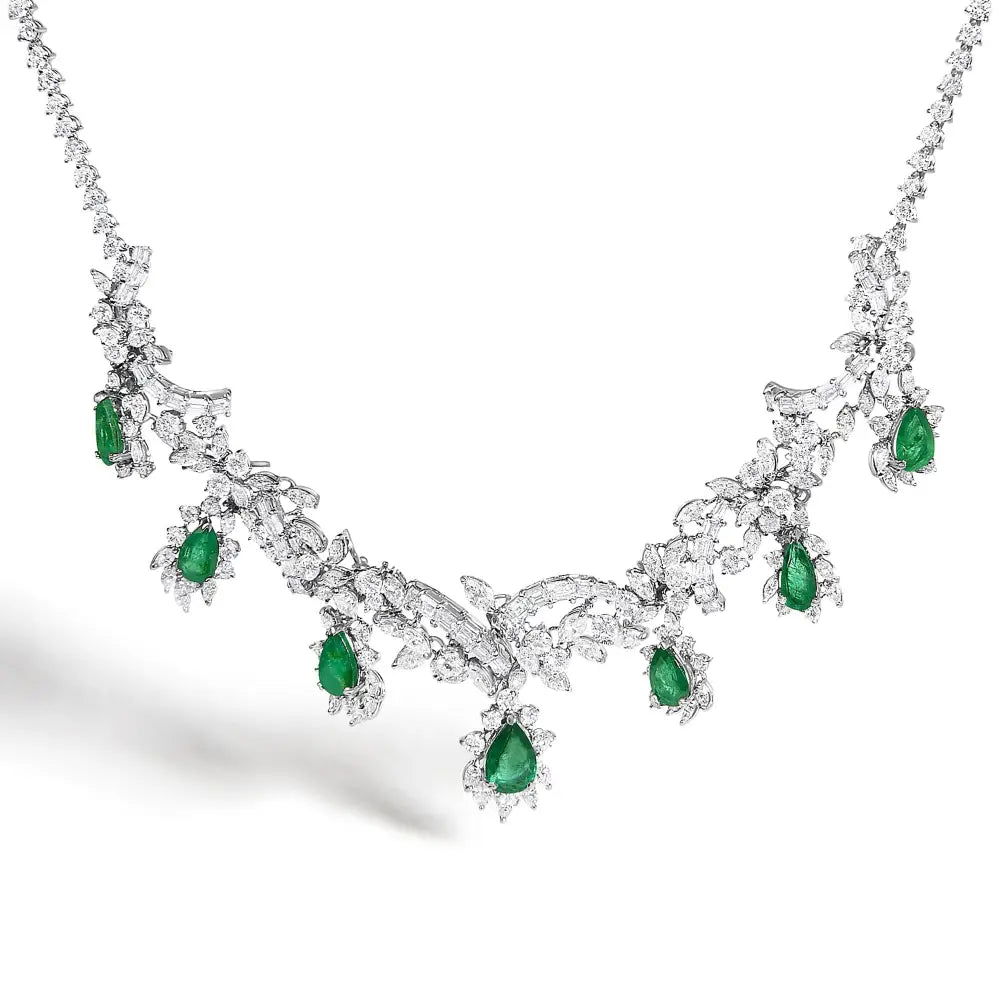 Platinum brazilian emerald and diamond jewelry set 38.30ct 19.76ct bijoux-nyc direct