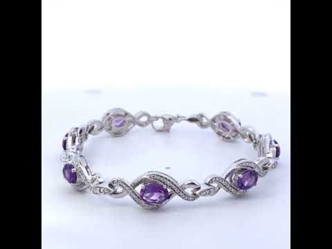 .925 Sterling Silver 1/10 Cttw Natural Round Diamond and 7X5MM Oval Amethyst Cross Tennis Bracelet (I-J Color, I1-I2 Clarity) - 7"