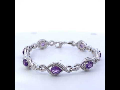 .925 Sterling Silver 1/10 Cttw Natural Round Diamond and 7X5MM Oval Amethyst Cross Tennis Bracelet (I-J Color, I1-I2 Clarity) - 7"