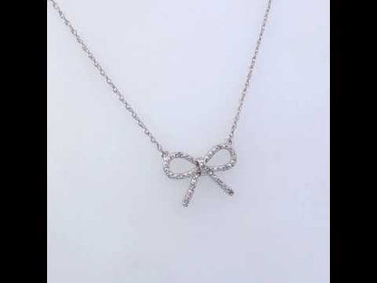 .925 Sterling Silver Diamond Accent Ribbon Bow Knot Pendant Necklace (J-K Color, I2-I3 Clarity) - 18" Inches